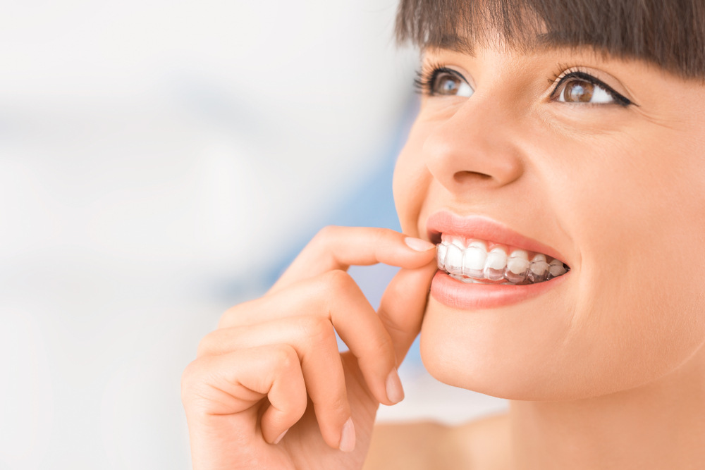 Invisalign can help you achieve a beautiful and confident smile.